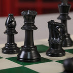Foldable vinyl chessboard showing sturdy plastic chess pieces included