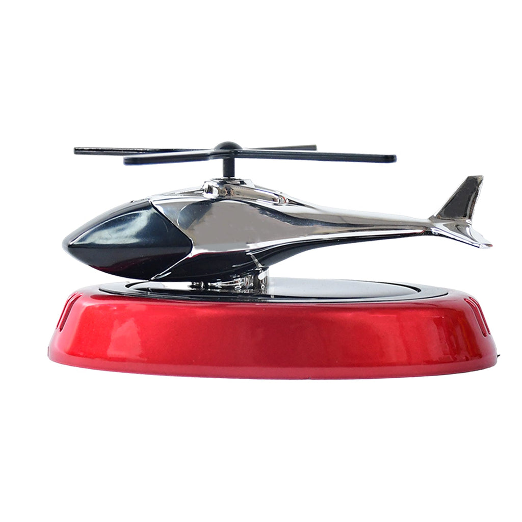 Solar helicopter air freshener positioned inside car interior