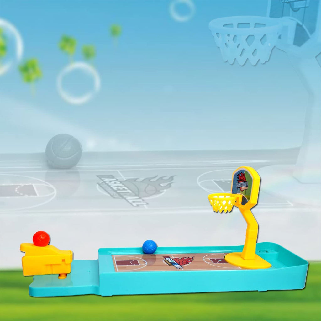 A hand launching a ball in the Finger Basketball Game, demonstrating gameplay.
