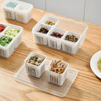 A fridge storage box brimming with fresh, colorful fruits and vegetables.