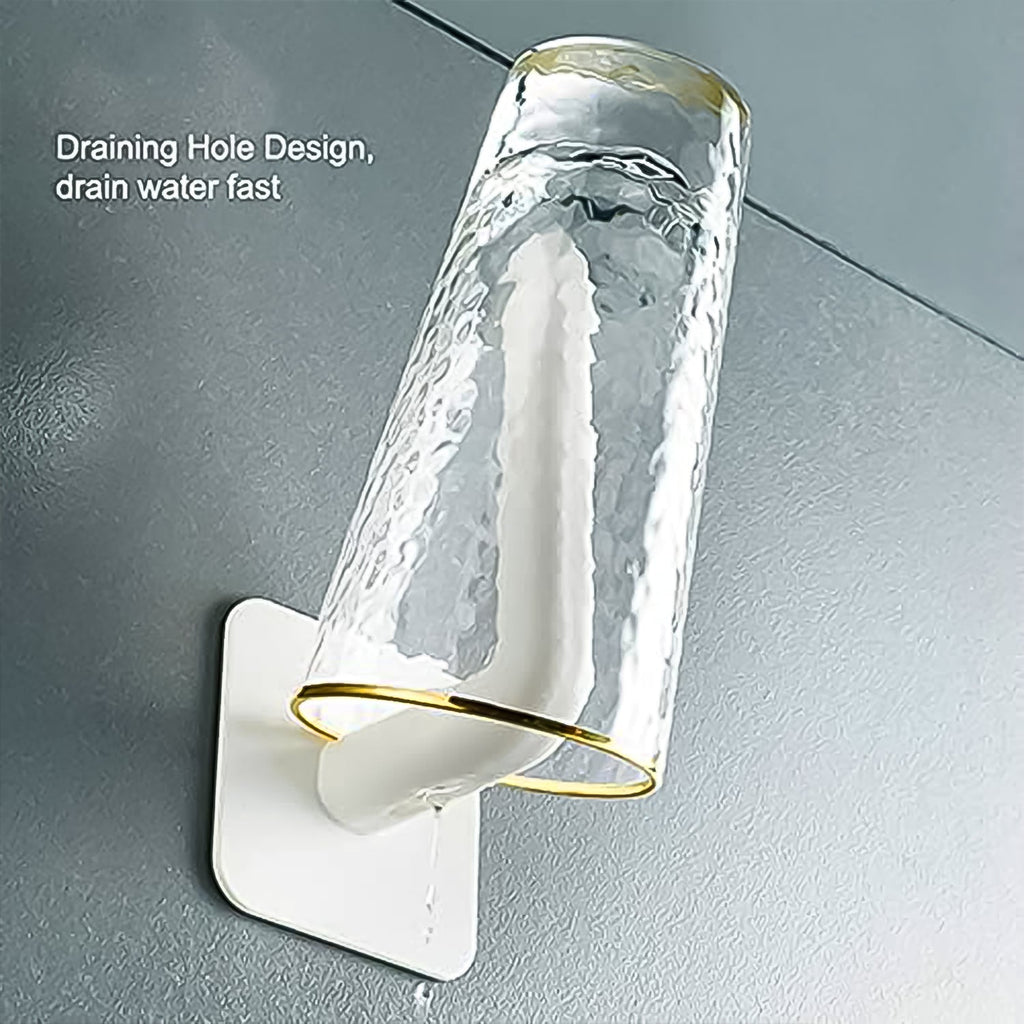 A hanging storage rack neatly organizing toiletries and a roll of toilet paper on a bathroom wall, demonstrating its versatility.