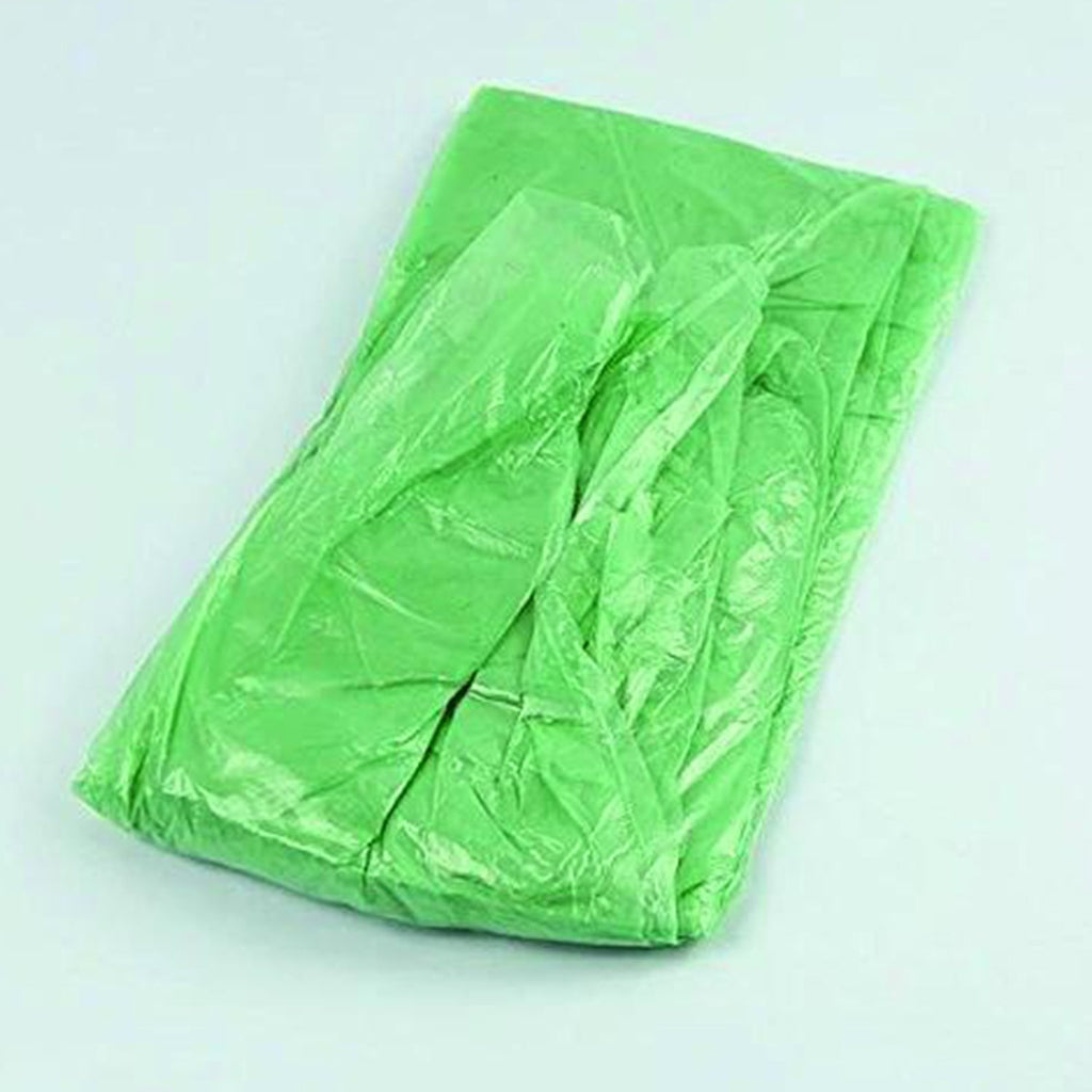 A hand holding the lightweight disposable raincoat, demonstrating its compact size.