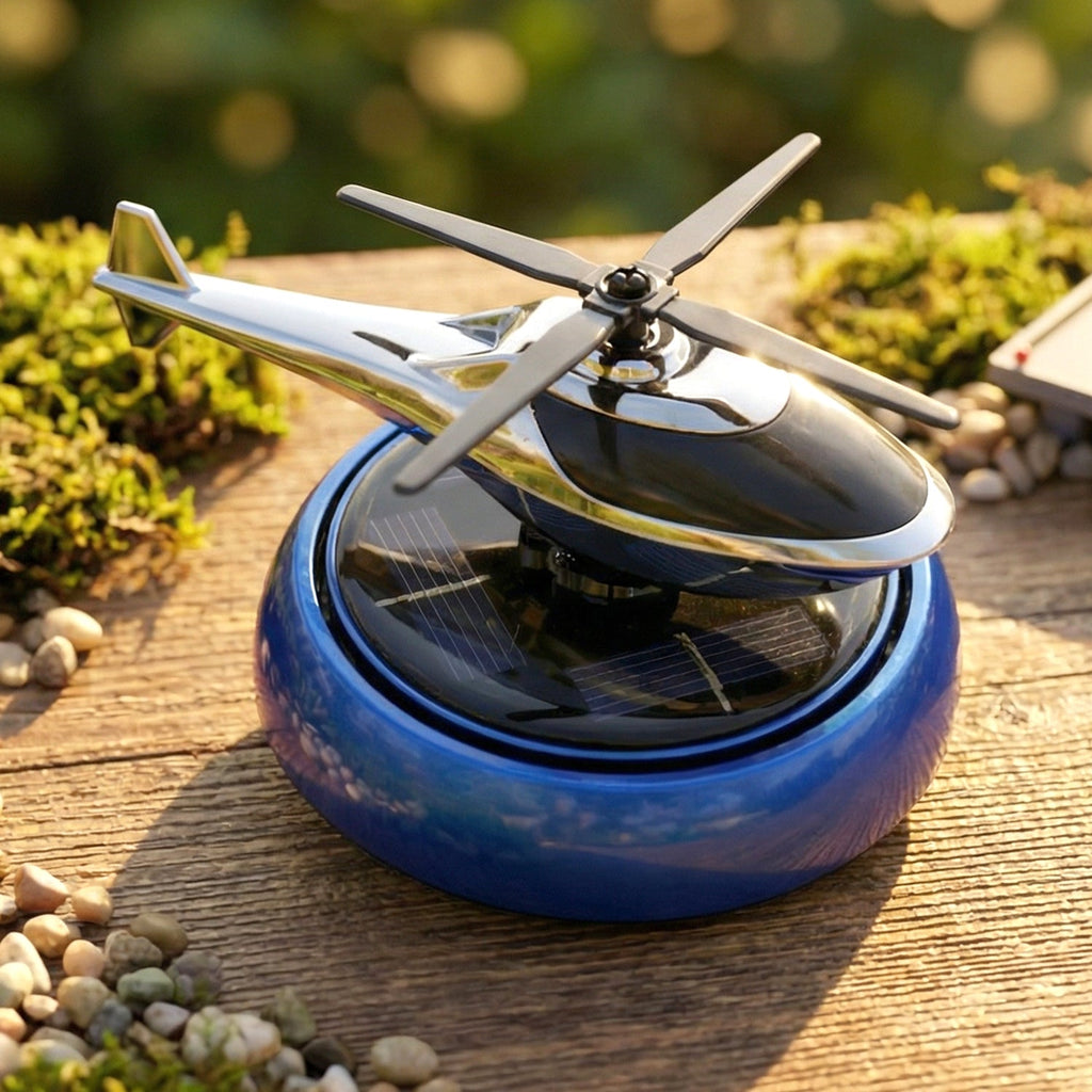Solar powered rotating helicopter air freshener for car interior