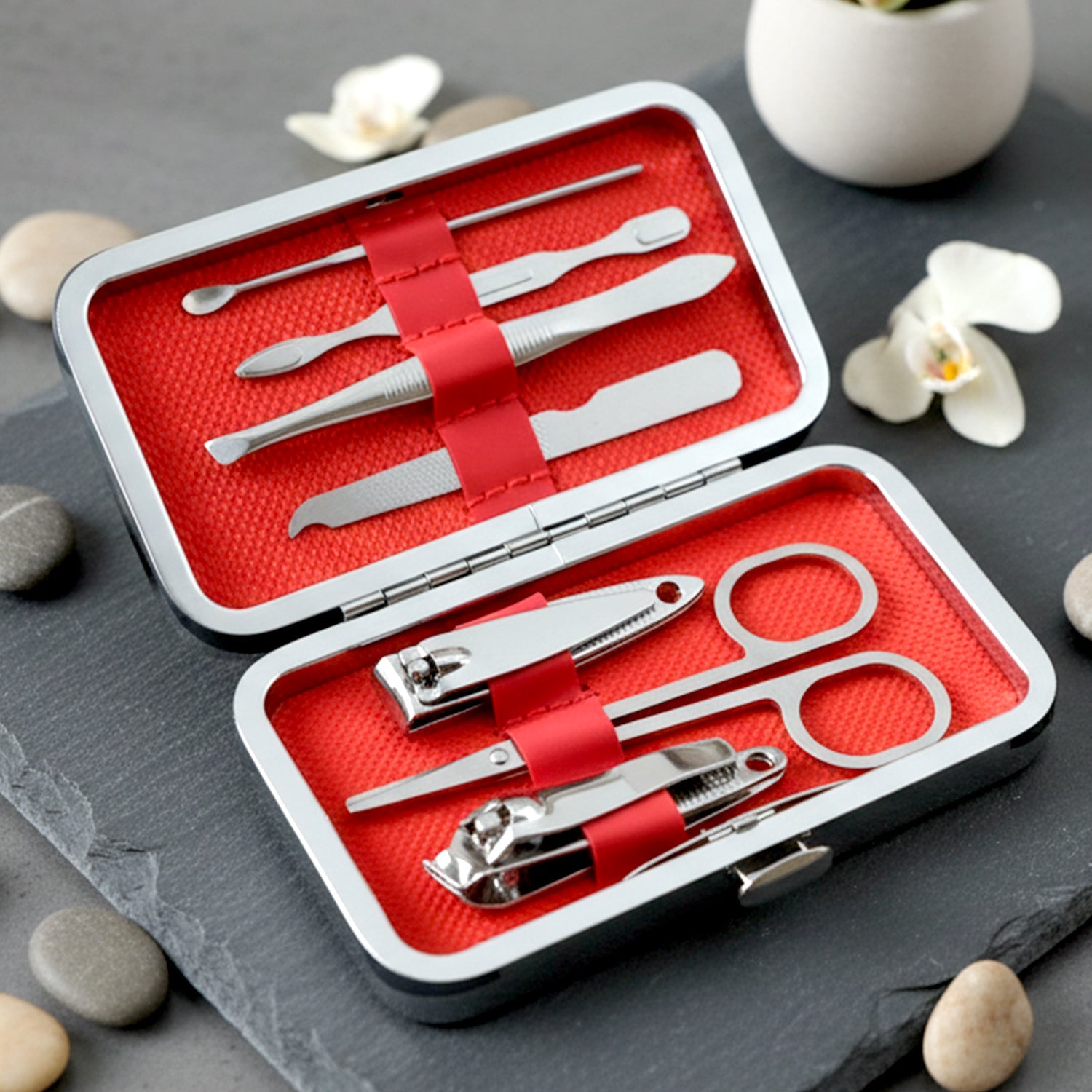 Complete manicure and pedicure grooming kit showing all stainless steel tools