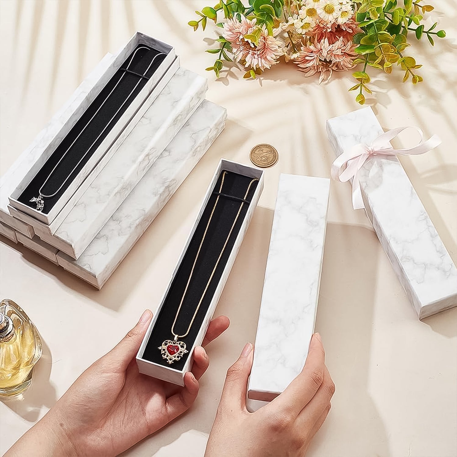 Side view of the empty marble finish jewelry gift box, showcasing its elegant profile, 21x5cm.