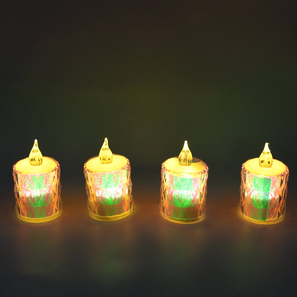 Multiple flameless LED candles beautifully arranged as part of a Diwali decoration setup.
