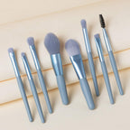 A single foundation brush from the mini makeup brush set, highlighting its dense synthetic bristles.