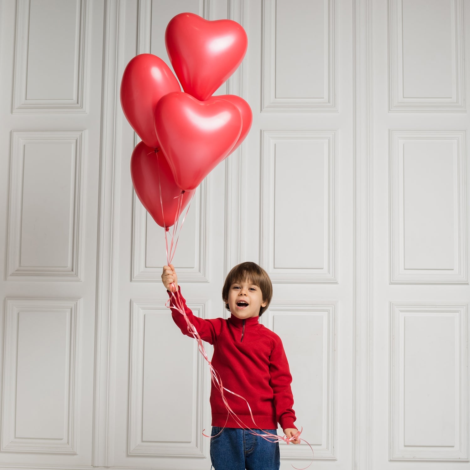 Assorted heart shaped balloons in bright colours, perfect for party decor.