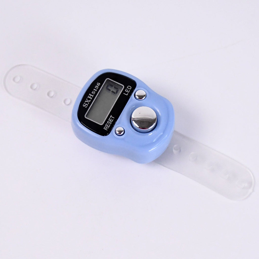 Compact digital finger counter featuring adjustable loop strap for easy use