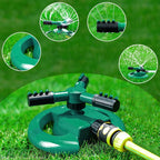 The base of a rotating garden sprinkler showing hose connection point.