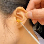 Innovative spring-spiral ear wax remover tool for gentle and effective cleaning.