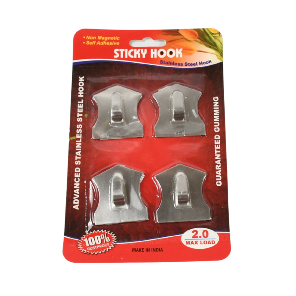 Durable adhesive hooks neatly organizing kitchen utensils on a tiled wall.