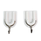 Bathroom organization with an adhesive hook securely holding a towel.