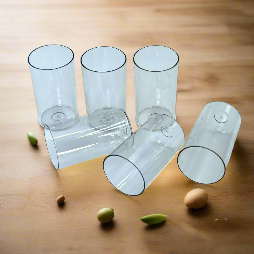 Ganesh Premium plastic tumblers set in a vibrant display setting.