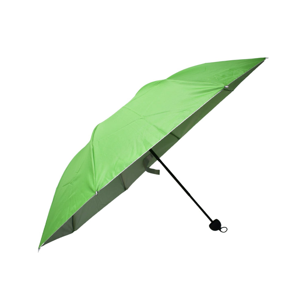 Portable 3-fold umbrella next to a smartphone, highlighting its compact size.