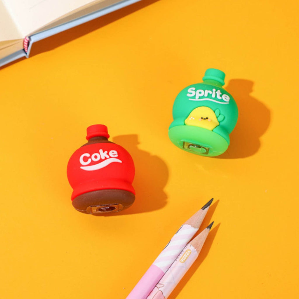 Close-up of the bottle shape pencil sharpener in action, collecting shavings.