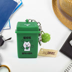 Tiny Trash Can Keyring attached to keys, adding quirky eco-friendly style