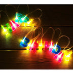 Decorative Happy Birthday LED string lights displaying vibrant colours for party ambience