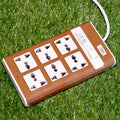 Extension board with six universal sockets and a master switch.