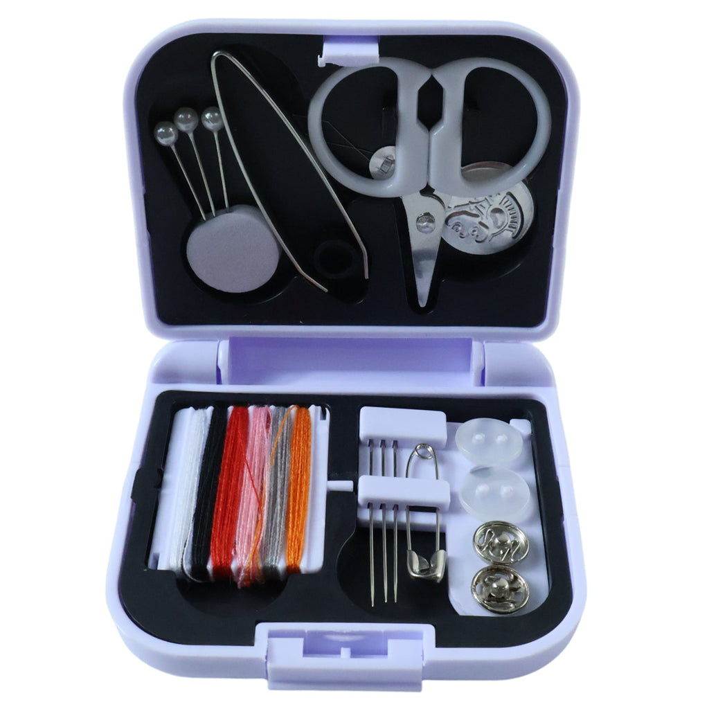 Feature close-up of sewing tools including scissors and buttons in compact sewing kit