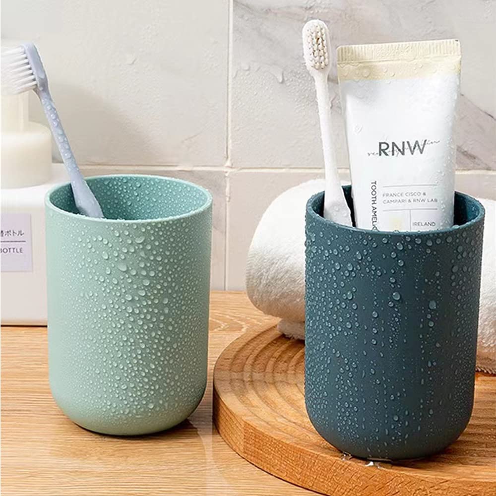 Multipurpose wall mount holder neatly storing toothbrushes, toothpaste, and cups, enhancing bathroom organization.