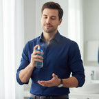 Aqua Perfume bottle with water droplets highlighting freshness
