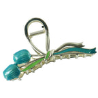 Close-up of floral patterned metal hair claw clip