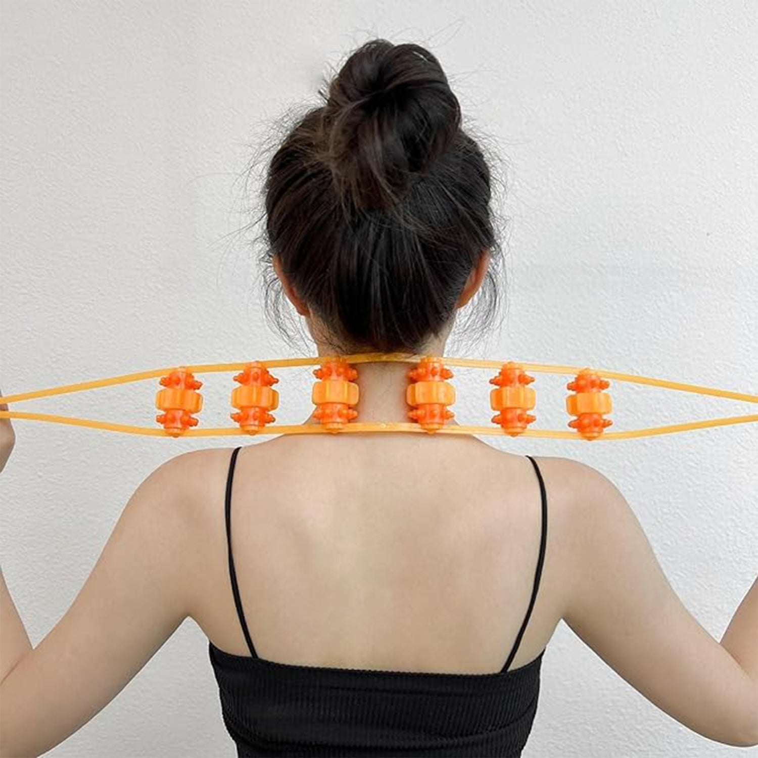 Velvet Wellness handheld back massage roller rope on white background