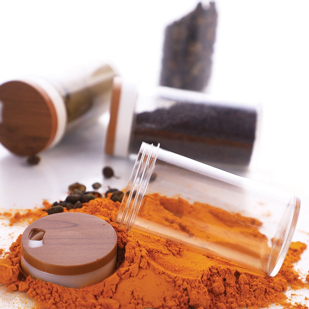 Side view of the compact Ganesh Storewell 8-jar plastic spice organizer.
