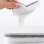 Durable triangle cleaning brush tackling hard-to-reach areas in the kitchen.