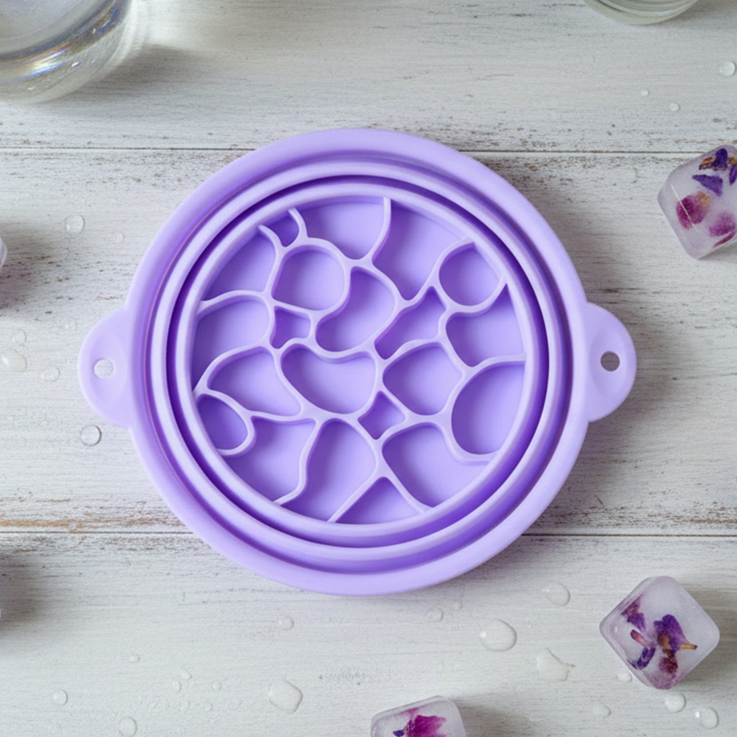 Collapsible silicone basin designed for facial ice baths and cooling