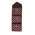 Space-saving foldable hanging organizer providing storage in a modern room.