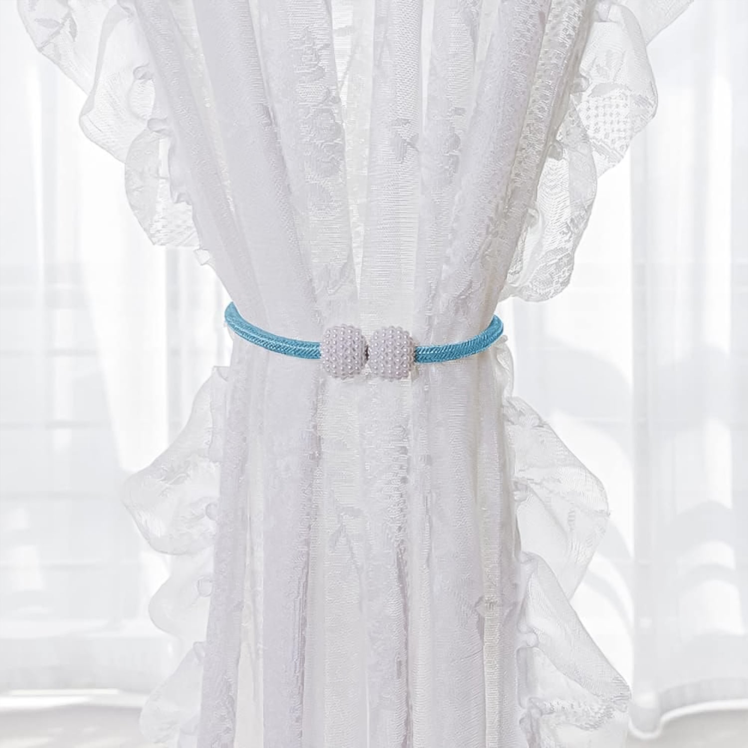 Set of two magnetic curtain tiebacks featuring pearl accents