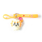 Decorative keychain featuring cartoon animal and ice cream charm