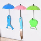 Assorted umbrella key holders, perfect for home organization and decor.