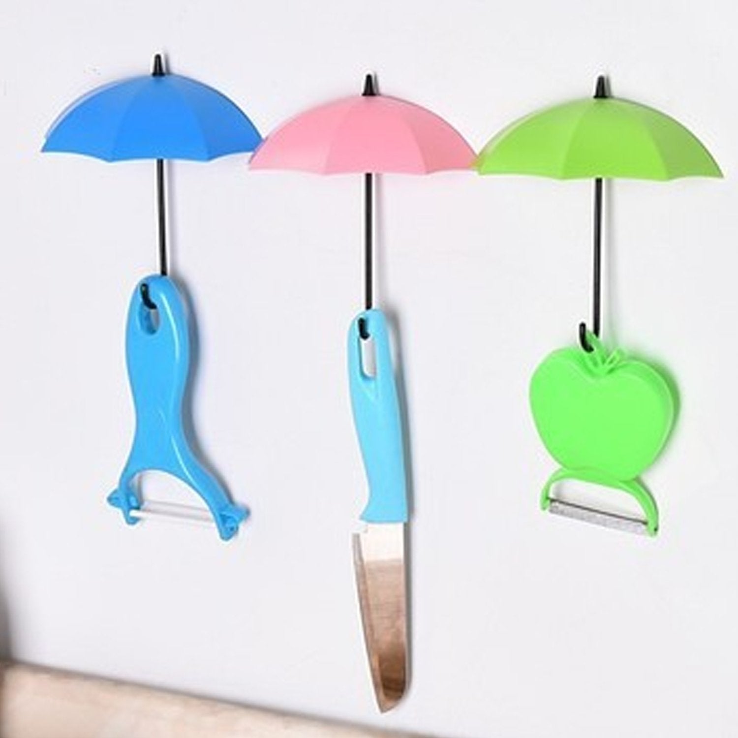 Assorted umbrella key holders, perfect for home organization and decor.