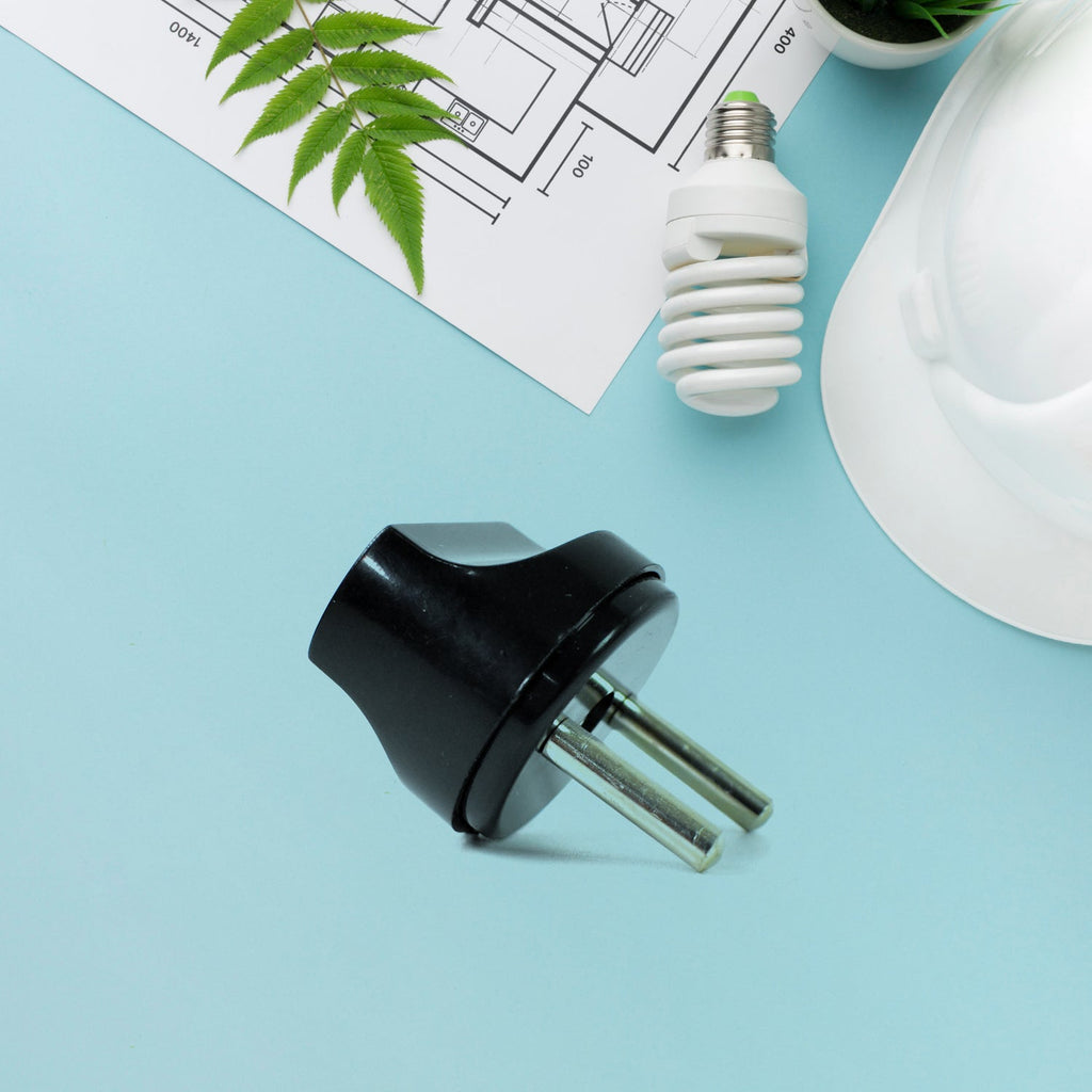 Side view of black 2 Pin Plug Adapter showcasing compact design