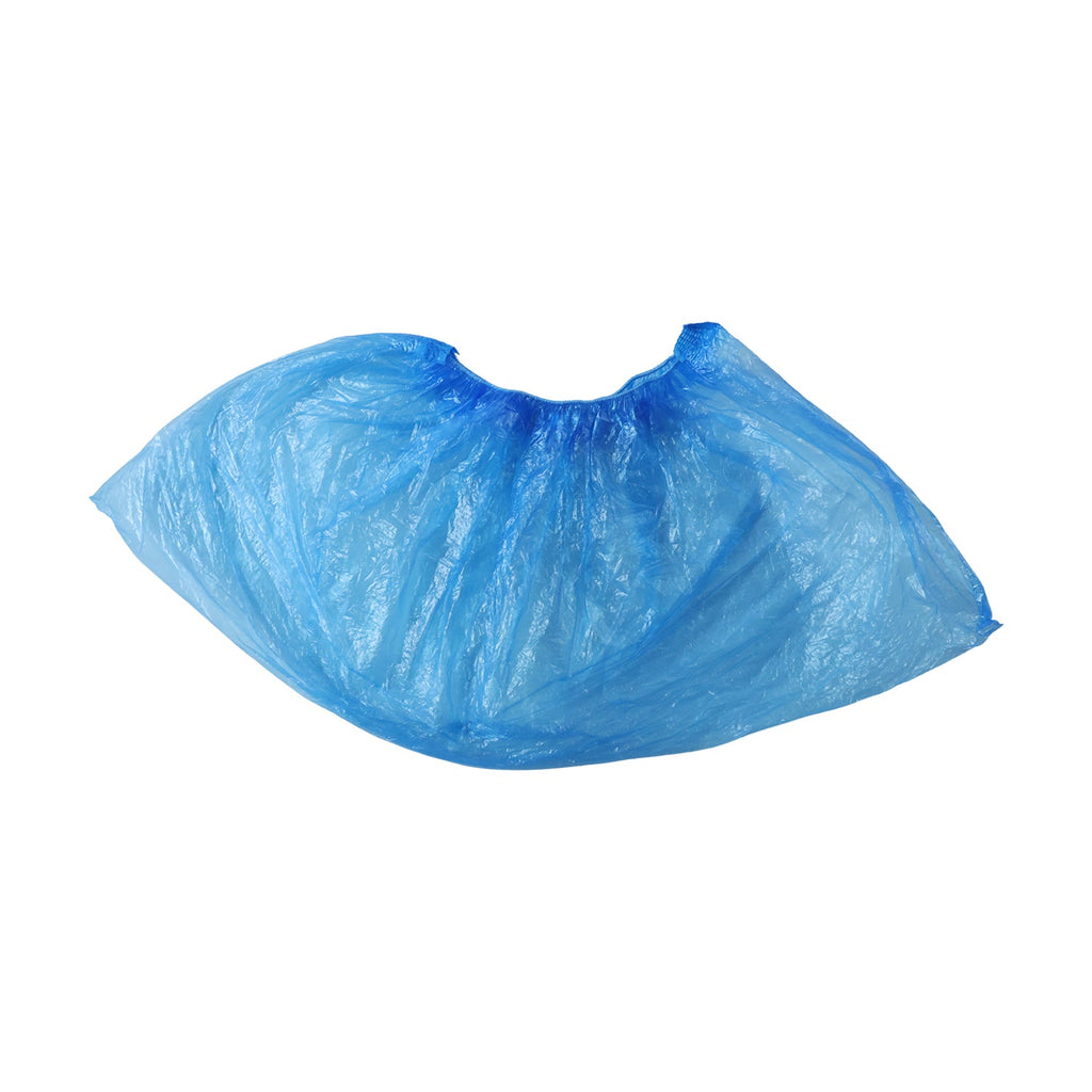 Stack of folded disposable shoe covers for hygiene.