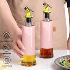 Multiple Vastate glass cruet bottles neatly arranged, showcasing their uniform design for storing different liquids.