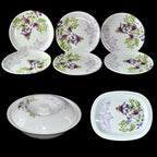Complete 32-piece plastic dinnerware set, including plates and utensils.