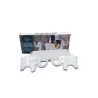 Creative elephant wall shelf securely mounted on a white wall.