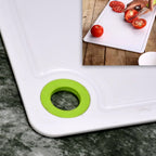 Skid-proof plastic cutting board with a smooth, hygienic surface for veggies and fruits.