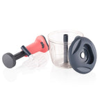 The manual vegetable chopper efficiently dicing onions without tears.