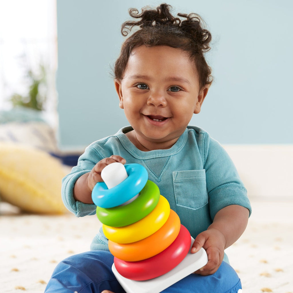 Colorful plastic stacking rings with a cute teddy bear head for kids.