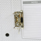 Organised documents held securely within the box file.