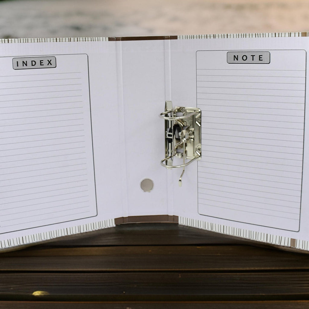 Multiple Lever Arch File Organizers stacked neatly on a shelf.