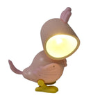 Magnetic Parrot Night Lamp showcasing its compact size and LED glow.