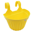 Close-up of a UV-stabilised plastic hanging planter showing its sturdy hook.