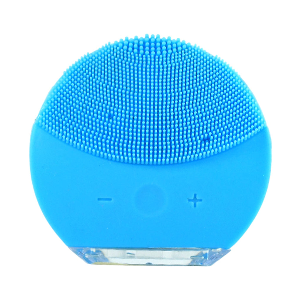 Facial cleansing brush glowing to show sonic technology in use