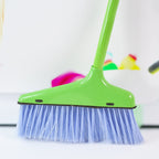 Dustpan and brush set showcasing adjustable handle and foldable dustpan features